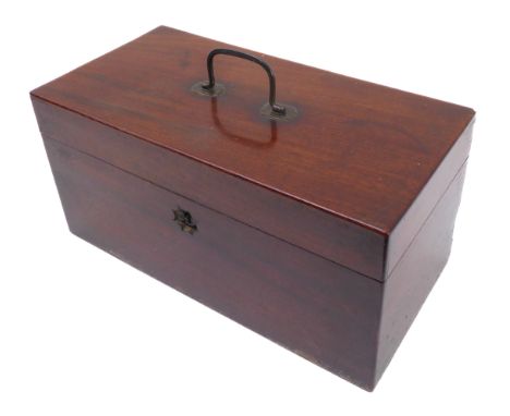 A George III period mahogany tea caddy with original handle and hinged lid opening to reveal two removable boxes and a centra