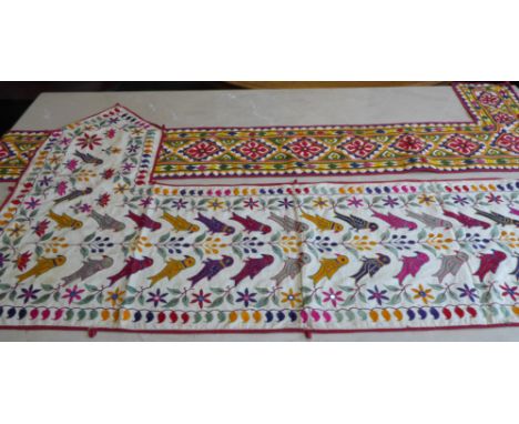 Two pairs of L-shaped wall hangings and Santia silkworks made by the Kanbi Saurashtra farming caste circa 1910-20, some decor