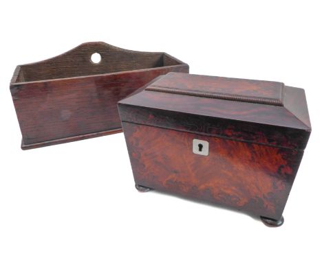 An early 19th century sarcophagus-shaped&nbsp;two-division tea caddy - rosewood and satinwood fronted and lidded, raised upon