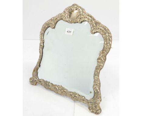 A hallmarked sheet silver easel-style lady's dressing table mirror - central vacant cartouche, in high rocaille style, the fr