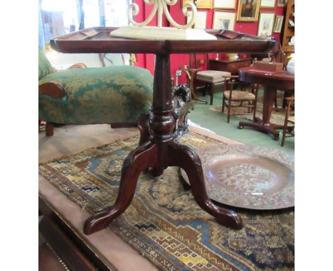 A George III style wine table the pinched cornered top on turned and reeded column with carved tripod base, 53cm high x 46cm 