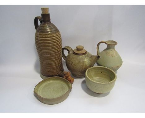 Five pieces of studio pottery domestic wares including Morris wine flagon, a teapot etc, all in oatmeal glazes