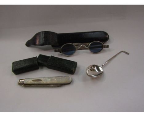 A pair of cased silver folding spectacles, silver spoon with golf club knop, mother-of-pearl and silver penknife