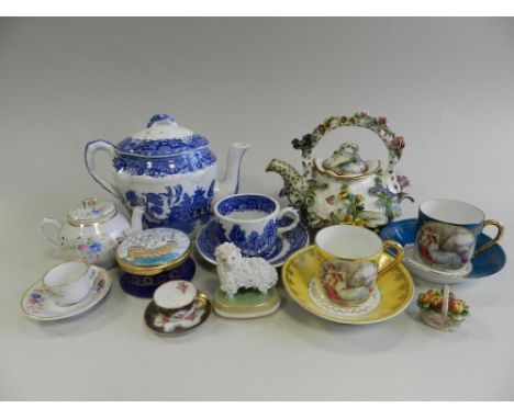 Three trays of assorted miniature porcelain tea and coffee wares along with a doll's part blue transfer printed tea service, 