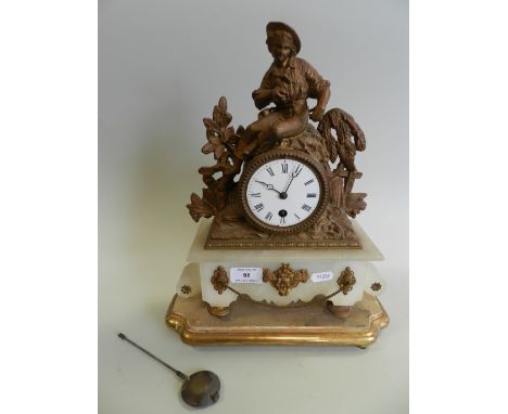 A late 19th century French white onyx and gilt metal figural mantel timepiece 