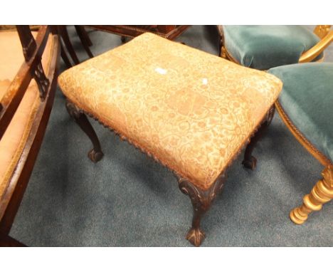 A 1920s/30s dark stained Chippendale style dressing stool with later covered over stuffed seat 