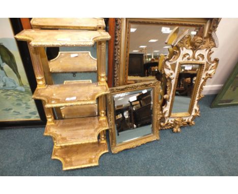 A collection of four wall mirrors and a small four tier gilt wall shelf