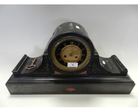 A Victorian black slate and rouge marble inset Aesthetic drum head mantel clock striking on a coiled gong