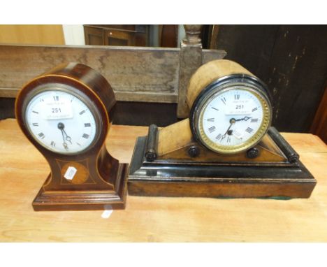 An Edwardian mahogany balloon shaped mantel timepiece case with later battery driven movement along with an Empire style drum