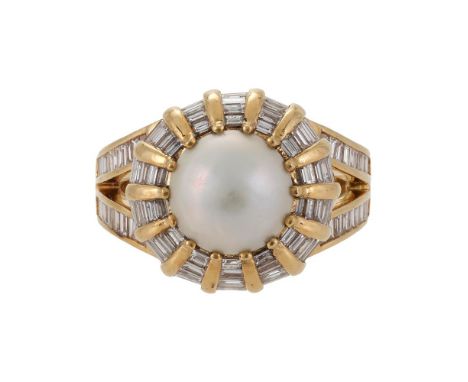 OGDEN, A DIAMOND AND CULTURED PEARL CLUSTER DRESS RING  SHEFFIELD 2013  The cluster centred with a half cultured pearl within