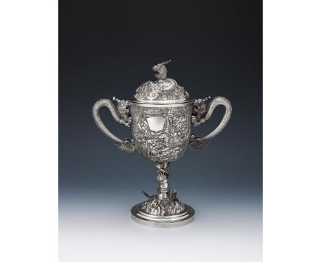A CHINESE SILVER TWIN HANDLED CUP AND COVER RETAILED BY LEE CHING, CIRCA 1870 The domed cover with a dragon finial among embo