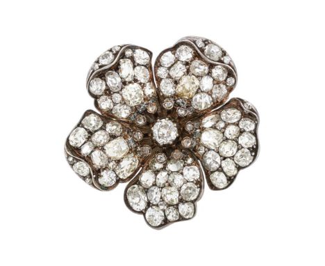 A LATE VICTORIAN DIAMOND SET DOG ROSE BROOCH  CIRCA 1890  The five petalled flower head set with various old cut diamonds, wi