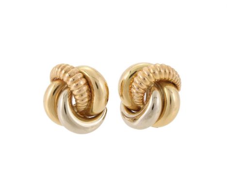 A PAIR OF TWO COLOUR KNOTTED EAR CLIPS  The intercepting polished and reeded knotted ear clips, stamped 750 with Italian cont
