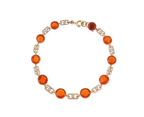 A 1920S AND LATER FIRE OPAL AND DIAMOND BRACELET The collet set graduated buff top circular cut fire opals to pierced gold re