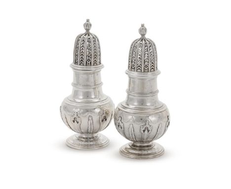 A PAIR OF GEORGE II SILVER BULBOUS CASTERS MAKER'S MARK ... W, LONDON 1731 With bud finials to the pierced domed covers, the 
