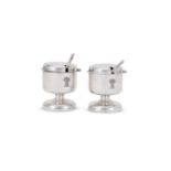 A PAIR OF SILVER MODERNIST MUSTARD POTS