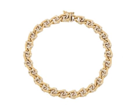 CHIAMPESAN, AN ITALIAN TWO COLOURED BRACELET   The two gold coloured fancy curb links, to a concealed box clasp signed Chiamp