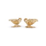 A PAIR OF SILVER GILT SHELL SHAPED PEDESTAL SALTS