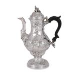 A GEORGE III SILVER OGEE BALUSTER COFFEE POT