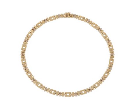 AN 18 CARAT GOLD FANCY LINK NECKLACE  BIRMINGHAM 1989 IMPORT MARK   The necklace composed of decorative articulated polished 