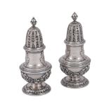 A PAIR OF GEORGE II CAST SILVER BALUSTER SUGAR CASTERS