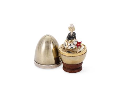 A SILVER GILT AND ENAMEL SURPRISE EGG STUART DEVLIN, LONDON 1974, NO. 53 Opening to a gnome sat on a toadstool and an enamell