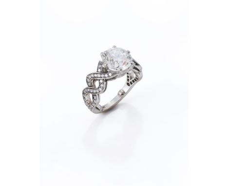 MOUNTED BY CASSANDRA GOAD, SERPENTINE, A DIAMOND RING  LONDON 2014  The cushion shaped brilliant cut diamond stated to weigh 