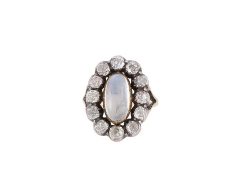 A DIAMOND AND MOONSTONE CLUSTER DRESS RING The central oval cabochon moonstone within a surround of old cut diamonds, approxi