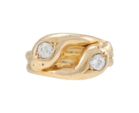 A LATE VICTORIAN DOUBLE SNAKE RING  With old cut diamond set heads, approximately 0.40 carats total, to polished coiled shank
