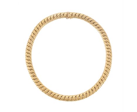 A GOLD COLOURED NECKLACE   The flattened fancy link chain to a concealed clasp, stamped 750 with Italian control mark  Size/d