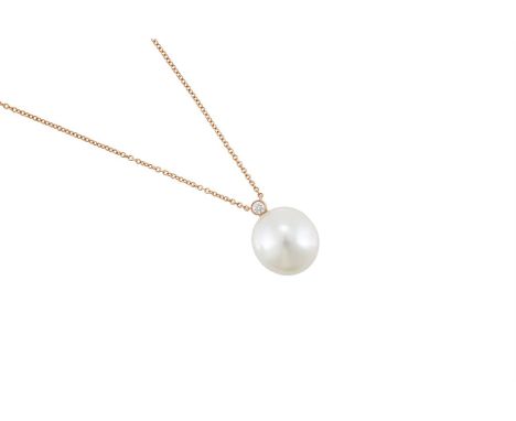 TIFFANY & CO., A DIAMOND AND SOUTH SEA CULTURED PEARL PENDANT ON CHAIN  The South Sea cultured pearl suspended from a brillia