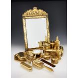 Y A CASED SILVER GILT TOILET SET