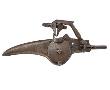 A wheel lock dating: second quarter of the 17th Century provenance: Germany Made of iron. Round plate with external wheel, sl