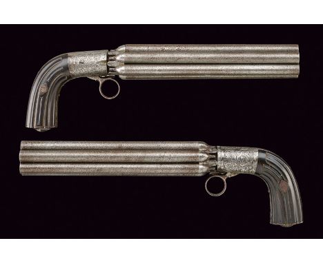 A very rare pair of pepperbox revolvers with long barrels dating: mid-19th Century provenance: France A set of six, very long
