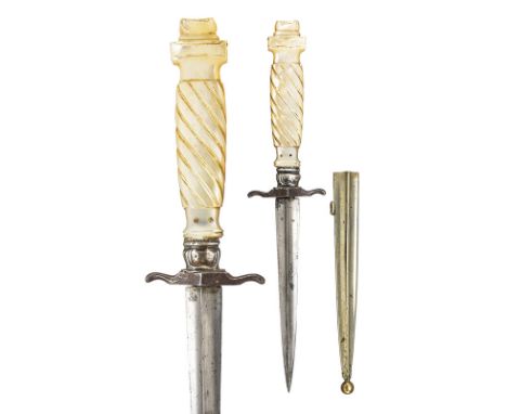 A small dagger dating: last quarter of the 18th Century provenance: France Strong blade with four edges; iron quillon, carved