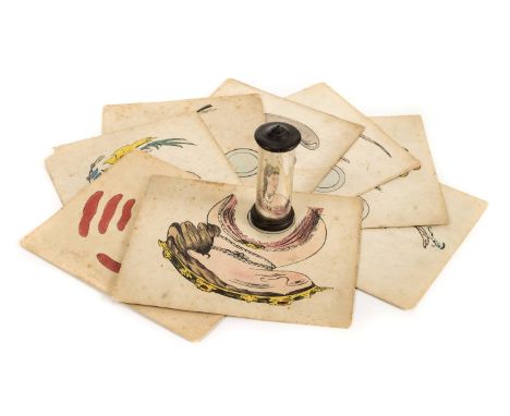 *Optical toy. A set of eight mirror anamorphosis cards, possibly French, circa 1860,  eight hand-coloured lithographs, toned 