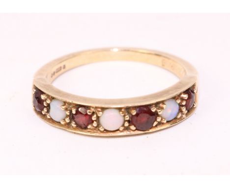 9ct gold ruby and opal set ring hallmarked approx 2.4gm    Condition Report   Click here for further images, condition, aucti