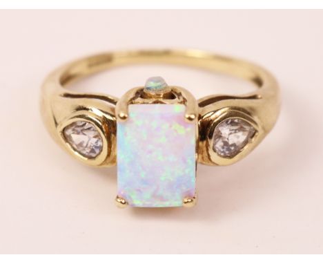 Opal and white topaz gold ring hallmarked 9ct   Condition Report   Click here for further images, condition, auction times & 