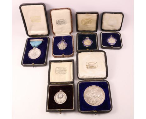 Silver and enamel London Academy of Music presentation fobs and silver medallion, glass cased International Chrysanthemum Soc