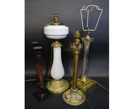 A Carved Wooden and Brass Mounted Table Lamp in the form of a Corinthian Column, together with two other table lamps and a pa