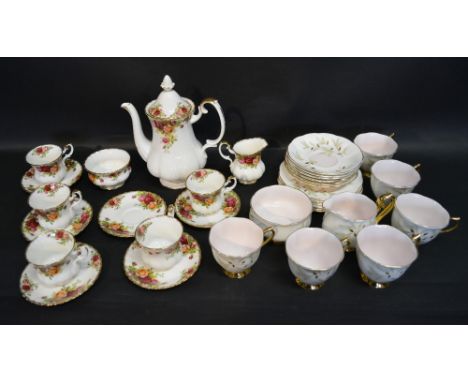 A Royal Albert 'Old Country Roses' Pattern Part Coffee Service, together with a Royal Albert 'Braemar Pink' Tea Service