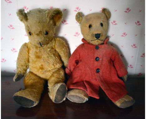 An Early 20th Century Teddy Bear with jointed limbs, together with another similar teddy bear