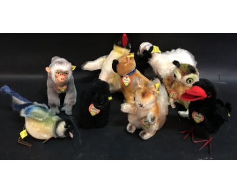 A Collection of Nine Steiff Miniature Models to include Coco, Boxer, Posse, Husky and Peggy