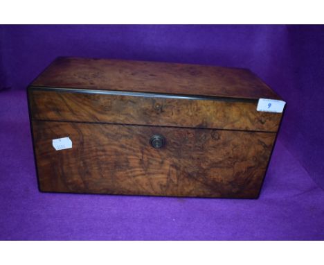 A fine Victorian tea caddy having walnut burr inner and outer casing with original silvered interior and glass well with HM s