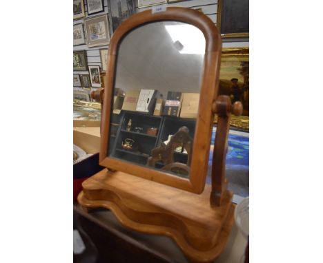 A mahogany framed adjustable dressing table mirror
