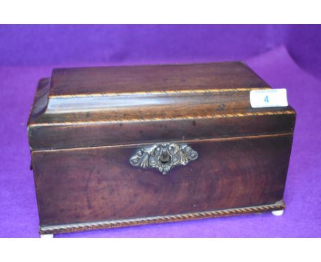 A Victorian tea caddy having mahogany case and inlaid banding with double compartment