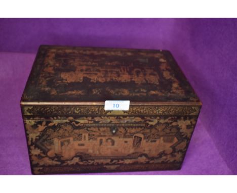 An late Victorian Japan lacquer tea caddy having highly decorated outer with pewter inner container
No substantial damage
Wea