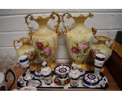 A selection of mantle vase and ceramic dressing table set