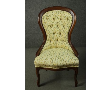 A contemporary late 19th century style stained beech spoon back chair, upholstered in light yellow fabric with a vine design,