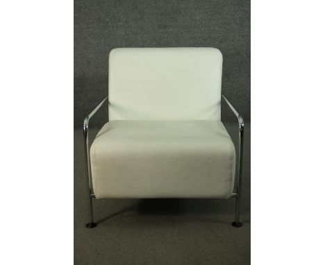 R T Design for Viccarbe, a contemporary Colubi lounge chair, with a tubular chromed frame, and white leather back and seat, b